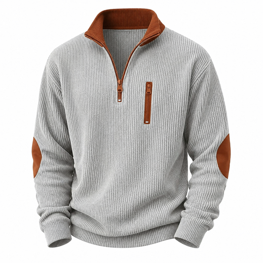 A men's ribbed knit quarter-zip pullover sweater in light gray with brown accents on the collar, zipper trim, vertical chest pocket, elbow patches, and zipper pulls, shown on a plain white background.