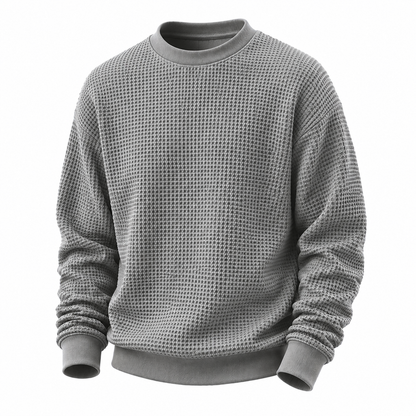 A gray waffle-knit crewneck sweatshirt with ribbed collar, cuffs, and hem, displayed on a clean white background.