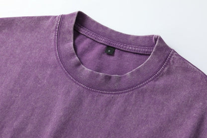 Close-up of the crew neck collar of a purple 100% cotton t-shirt by LoomBasics
