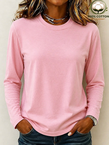 Woman wearing a pink 100% cotton crew neck long sleeve tee by LoomBasics