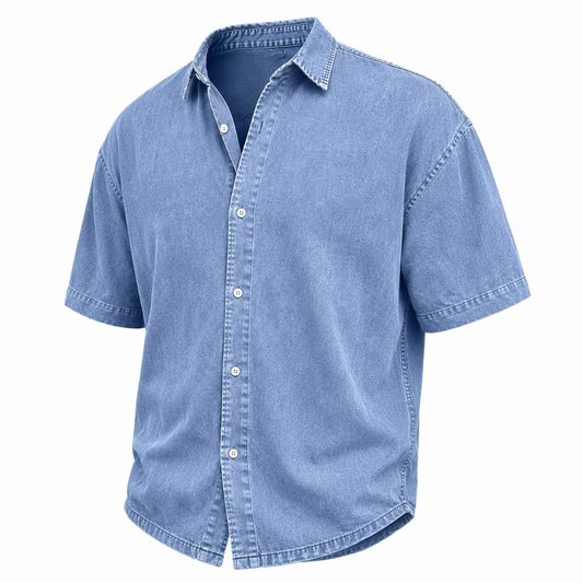 A light blue denim short-sleeve button-up shirt with a relaxed fit, shown on a solid white background.