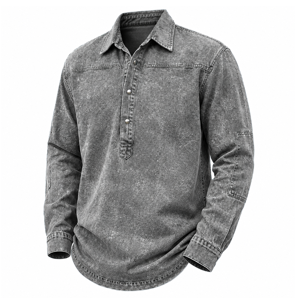 A long-sleeve button-up shirt in a washed charcoal gray color, featuring a classic collar, a short button placket, and a curved hem, shown against a plain white background.