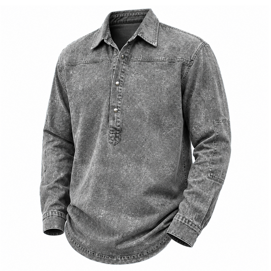 A long-sleeve button-up shirt in a washed charcoal gray color, featuring a classic collar, a short button placket, and a curved hem, shown against a plain white background.