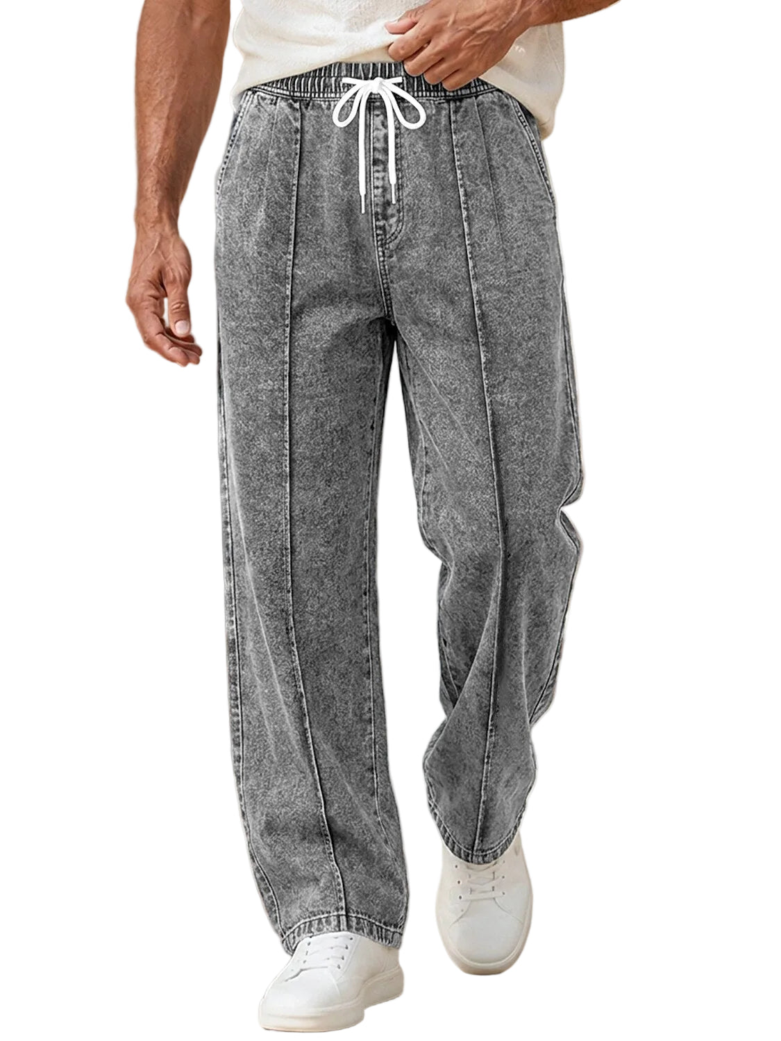 A person wearing wide-leg gray washed denim pants with a white drawstring waist, shown from the waist down