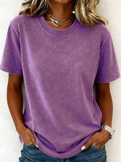 Woman wearing a purple 100% cotton crew neck t-shirt from LoomBasics