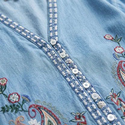 Close-up of LoomBasics embroidered boho 100% cotton blouse in light blue denim fabric
