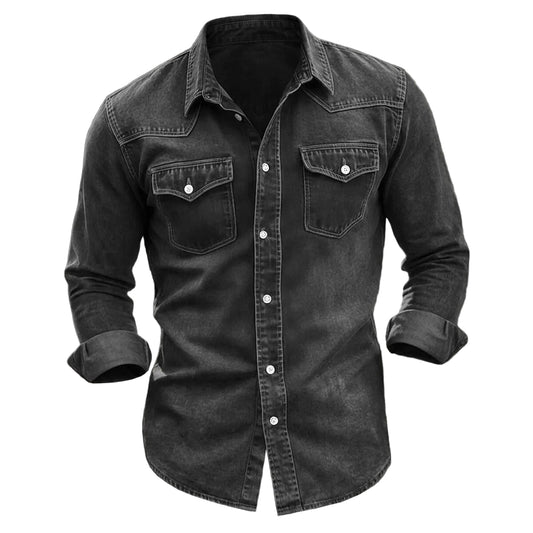 A dark charcoal gray denim long-sleeve button-up shirt with two chest pockets and white buttons