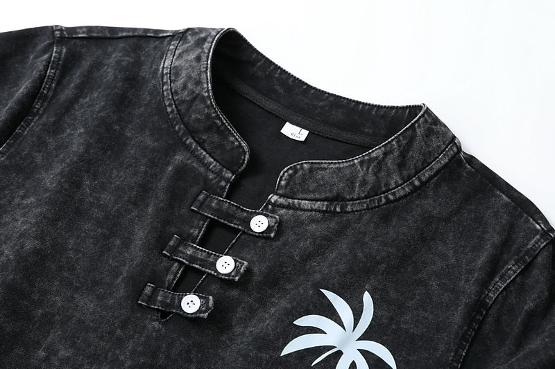 Close-up of a LoomBasics charcoal grey 100% cotton henley shirt with unique button detailing.