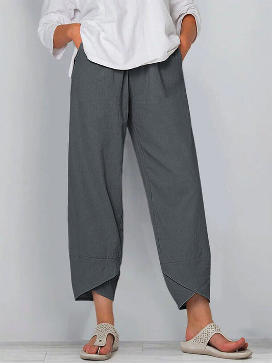 Woman wearing LoomBasics grey 100% cotton capri pants and beige sandals