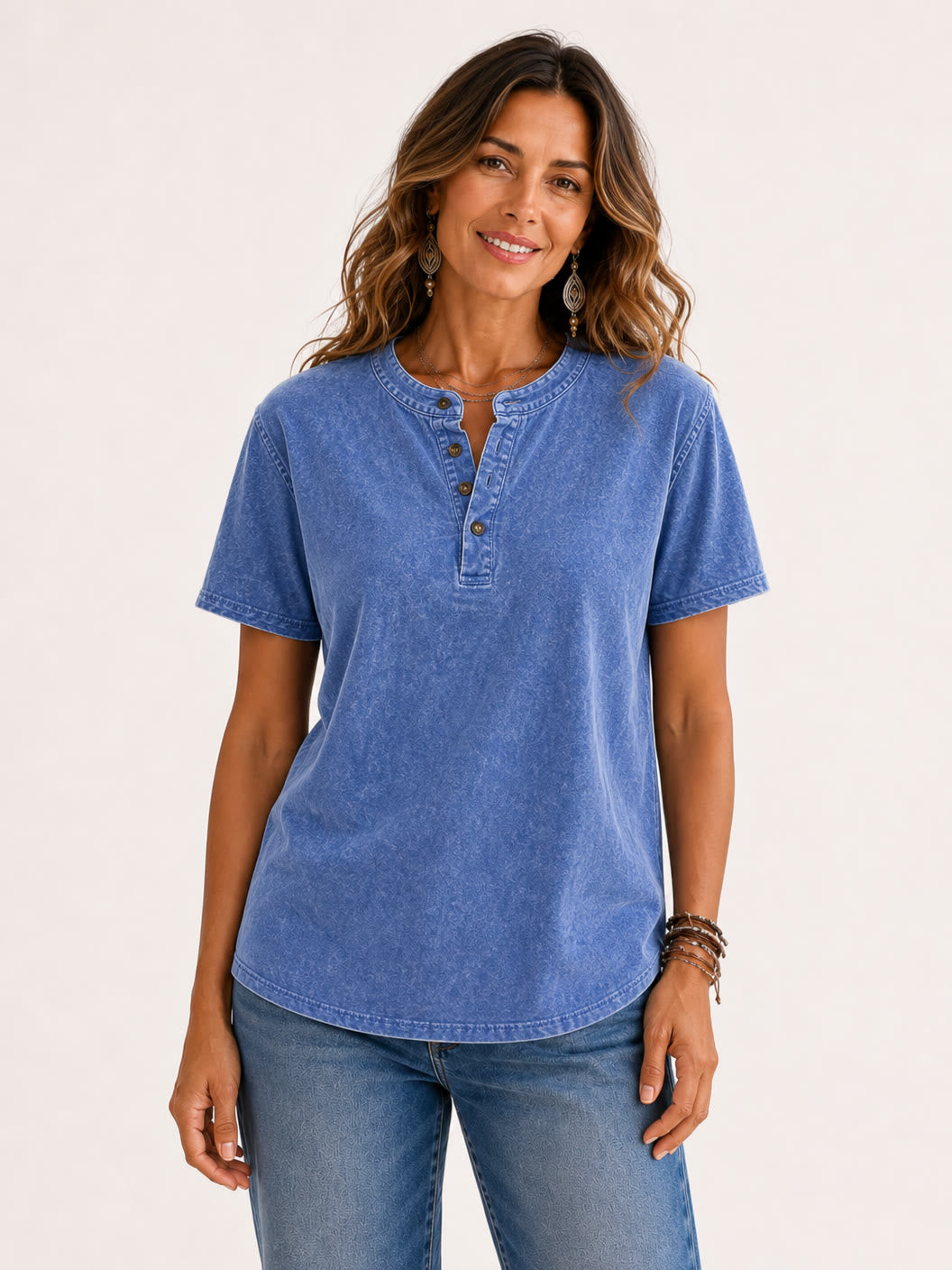 Woman wearing a LoomBasics blue 100% cotton short sleeve henley tee and blue jeans