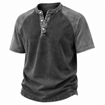 A dark gray washed short-sleeve henley shirt with a buttoned collar and raglan-style sleeves, shown on a plain white background.