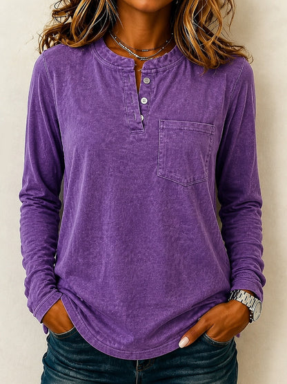 Woman wearing a LoomBasics vintage purple 100% cotton long sleeve Henley shirt with chest pocket