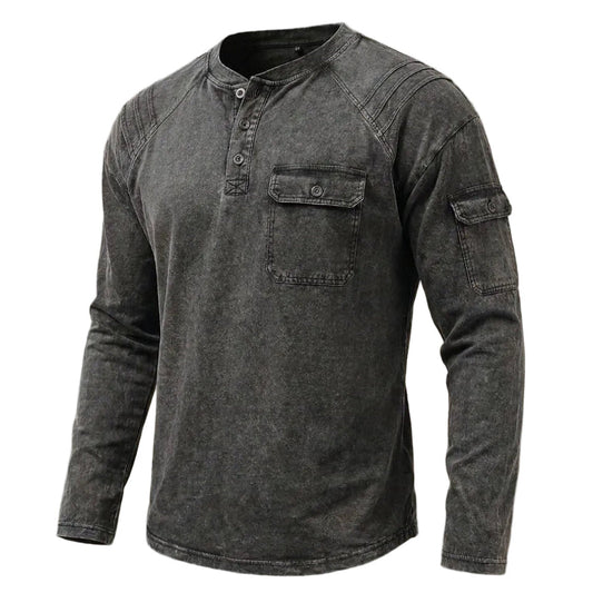 A dark gray, washed long-sleeve henley shirt with a buttoned collar and chest pocket